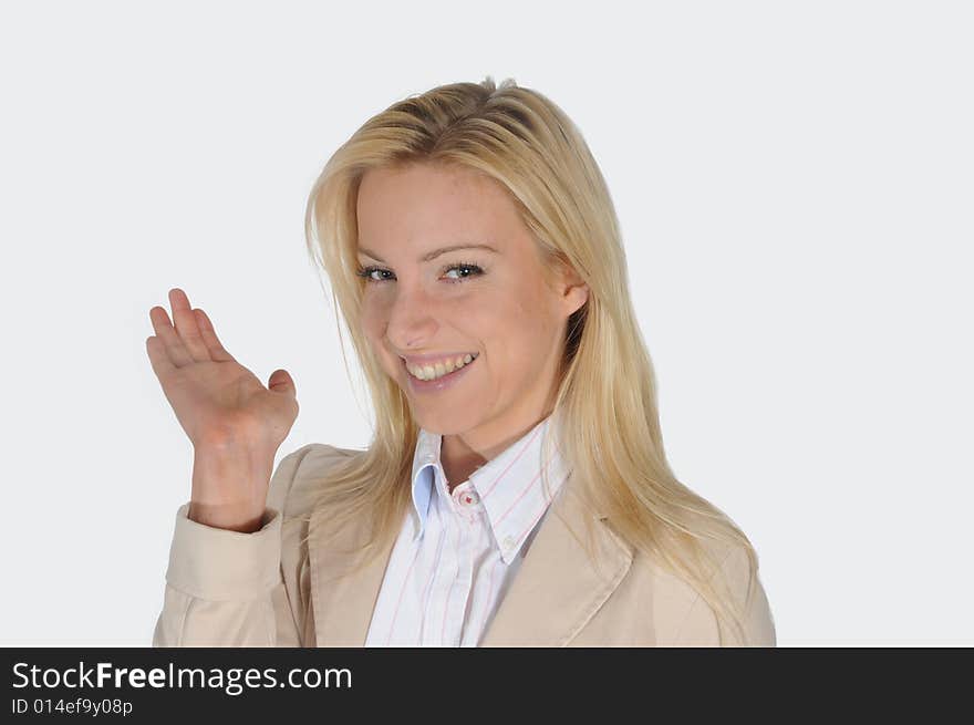 Young woman gesturing with one hand, smiling. Young woman gesturing with one hand, smiling.