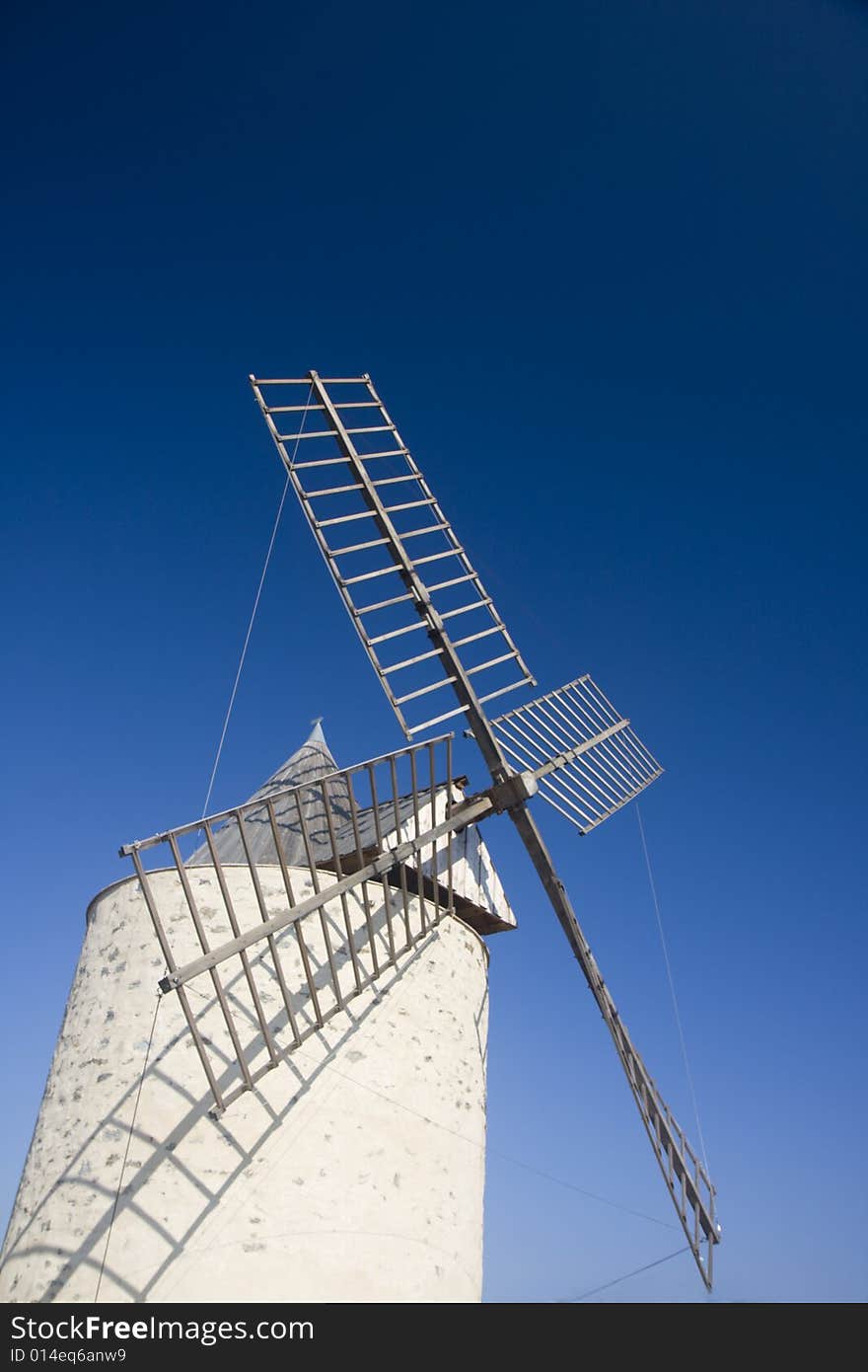 An old windmill on a sunny day in southern france