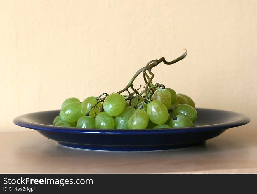 Grape-vine on a plate