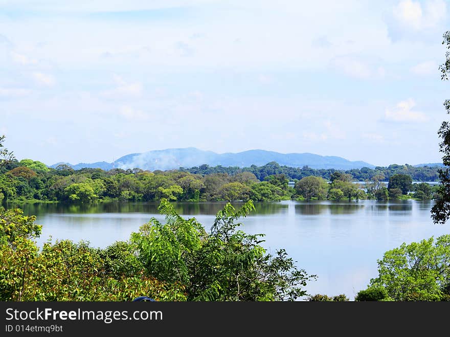 Lake side view with mountains. Lake side view with mountains