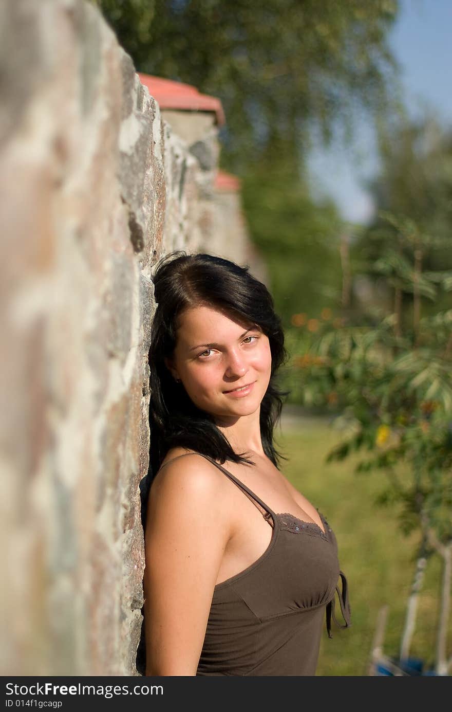 A young woman and wall