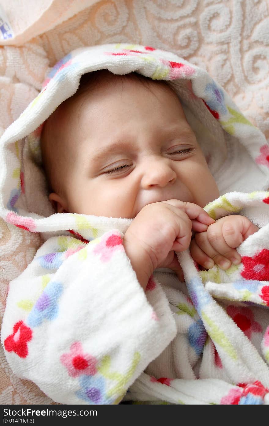 Little baby in dressing-gown before bath. Little baby in dressing-gown before bath.