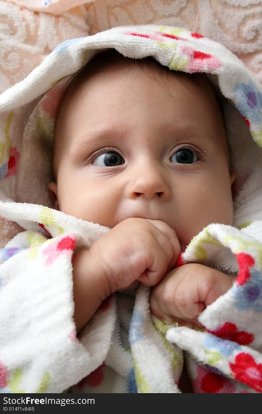 Little baby in dressing-gown before bath. Little baby in dressing-gown before bath.