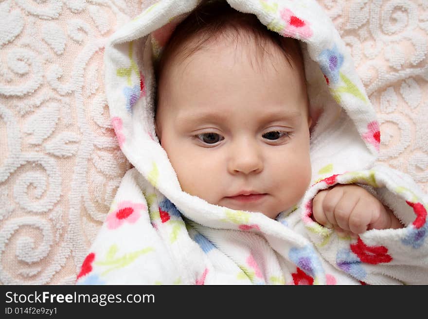 Little baby in dressing-gown before bath. Little baby in dressing-gown before bath.