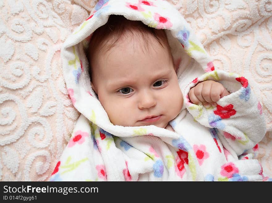 Little baby in dressing-gown before bath. Little baby in dressing-gown before bath.