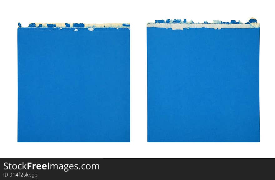 Blue pieces of paper isolated on white