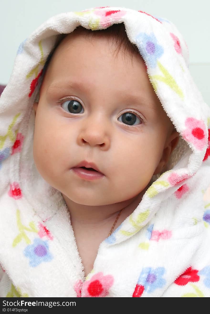 Little baby in dressing-gown before bath. Little baby in dressing-gown before bath.