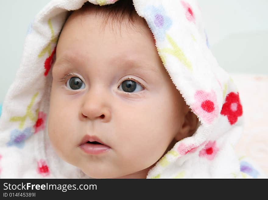 Little baby in dressing-gown before bath. Little baby in dressing-gown before bath.