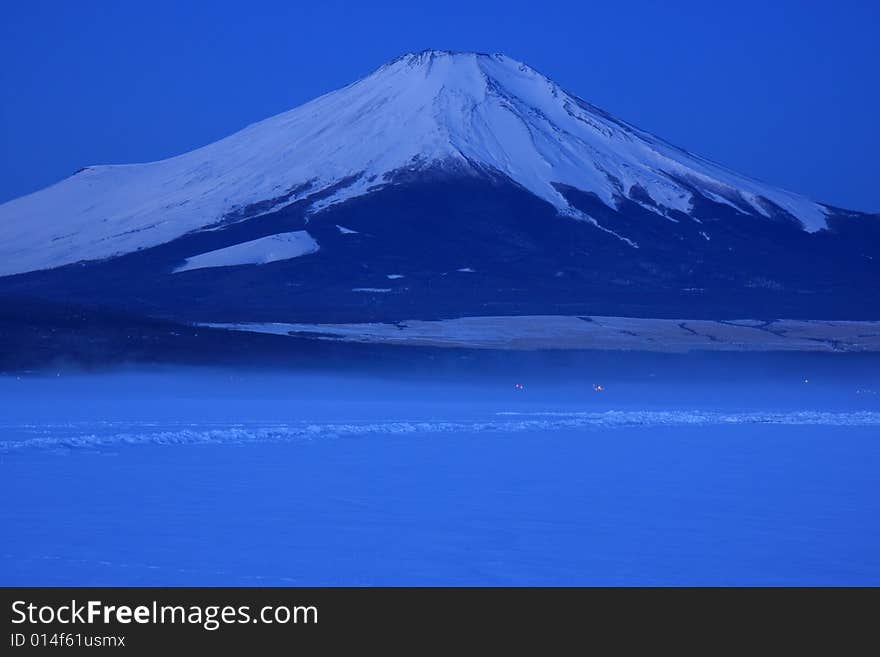 Predawn Mt. Fuji over freeze up Lake Yamanaka