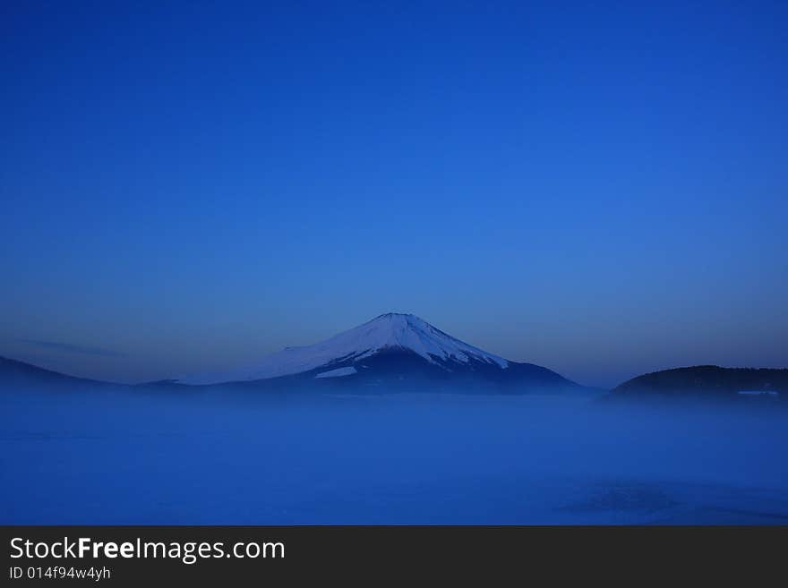 Predawn Mt. Fuji over freeze up Lake Yamanaka