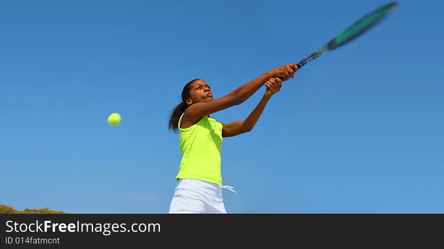 Teenage female tennis player