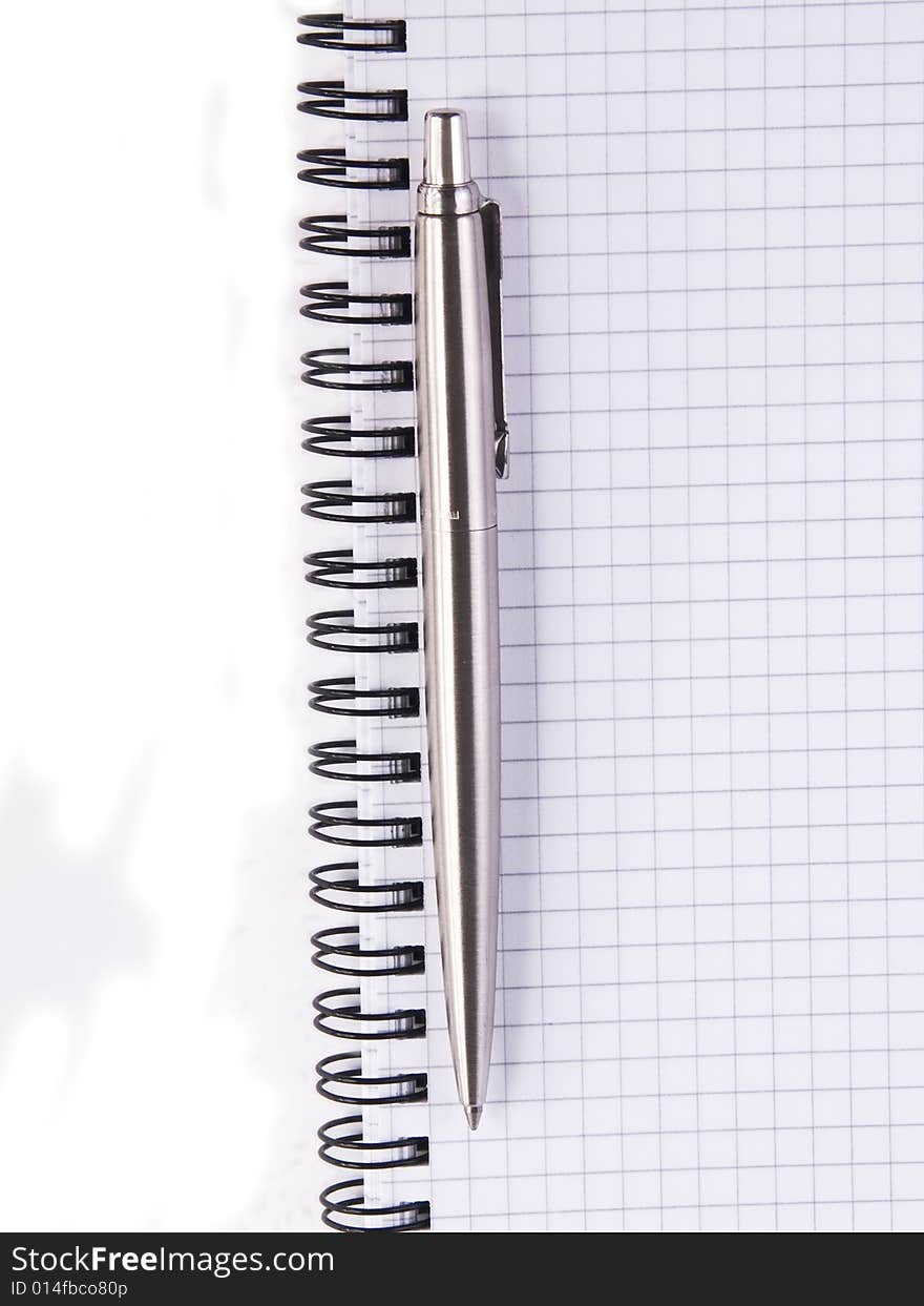 Pen and notebook, isolated on white background. Pen and notebook, isolated on white background.