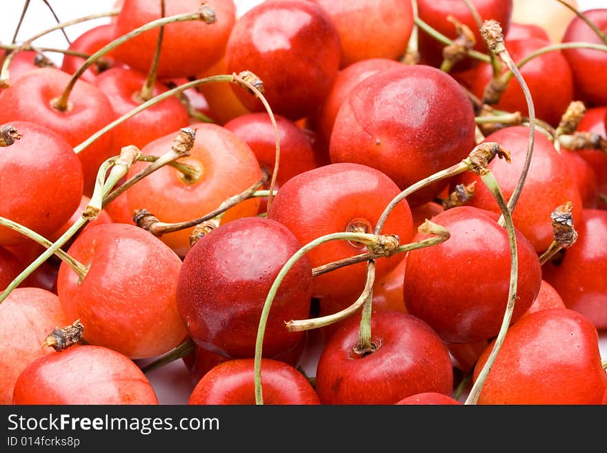 Fresh appetizing sweet cherry on a white background. Fresh appetizing sweet cherry on a white background