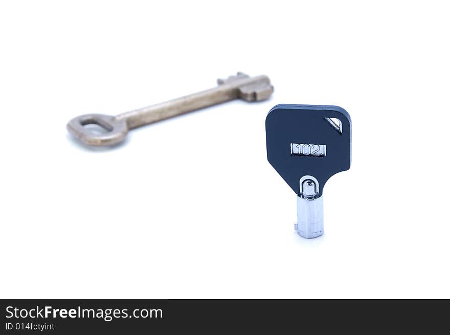 Small modern and large old key. Small modern and large old key