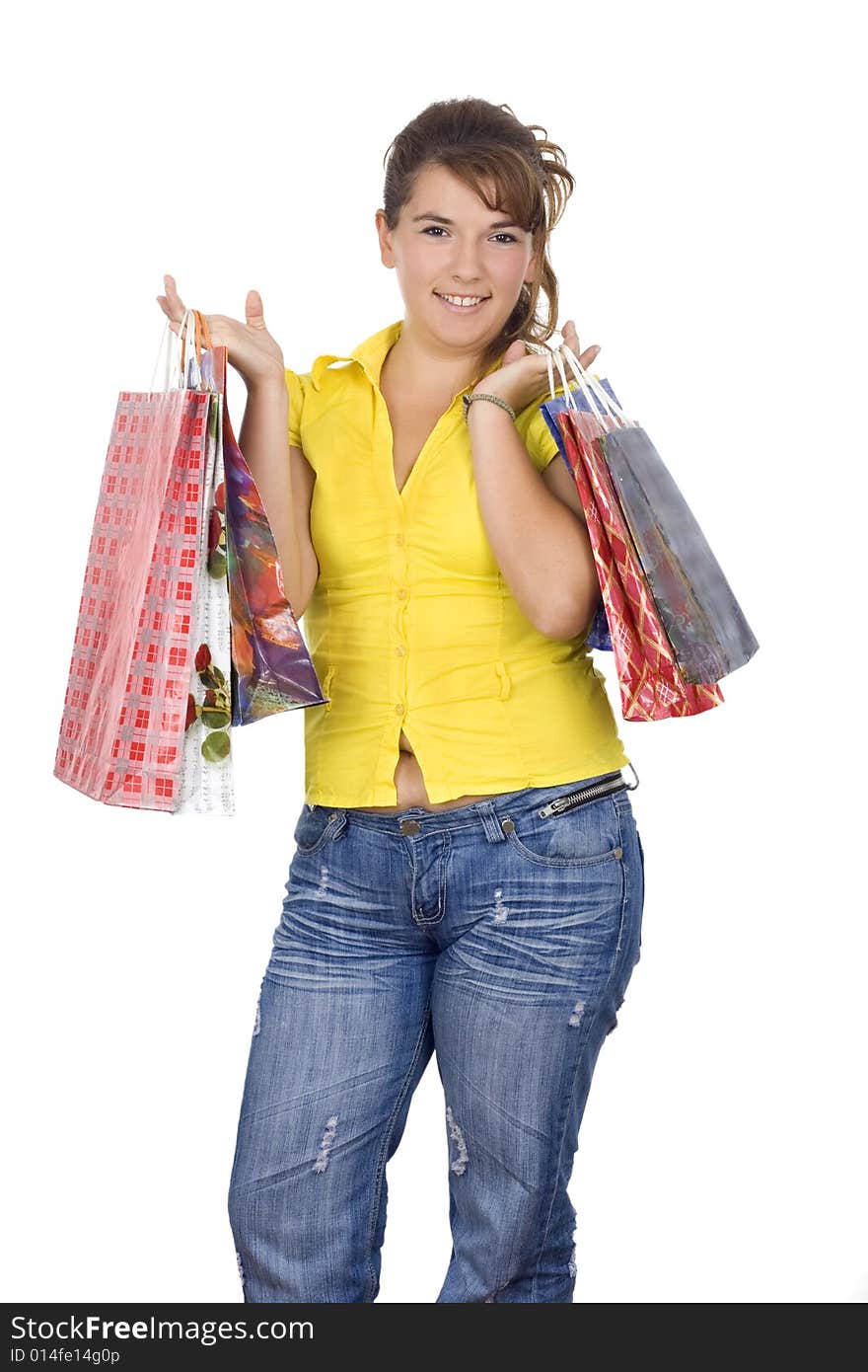 Happy girl holding shopping bags, isolated, on white background