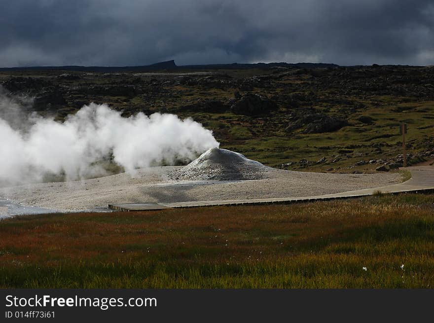 Extinct volcanic cones of yellow colour in the north of Iceland. Extinct volcanic cones of yellow colour in the north of Iceland