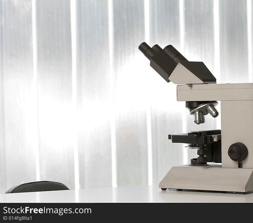 Image of microscope in a scientific lab