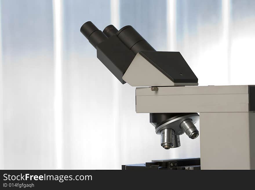 Image of microscope in a scientific lab