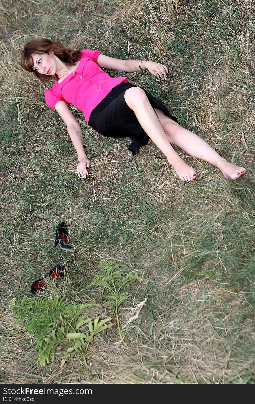 A nice girl lying in the field. A nice girl lying in the field