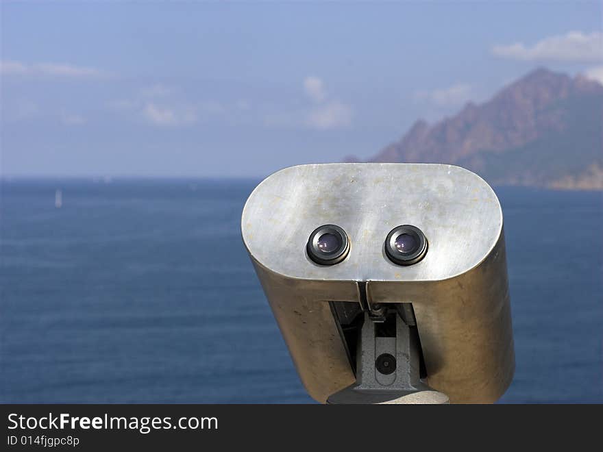 Coin-Operated Binoculars Outdoors near Corsican Coastline