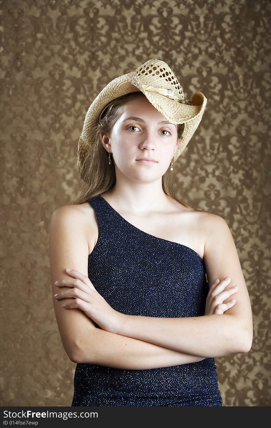 Confident Young Girl In A Cowboy Hat