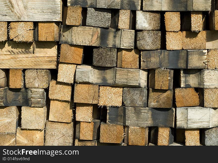 A texture of a stack of wood. A texture of a stack of wood