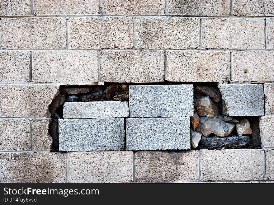 Wall and hole reaired by concrete blocks