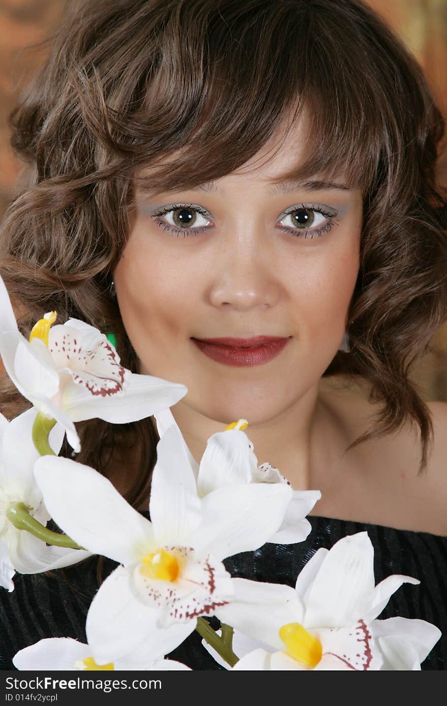 Woman With A White Orchid