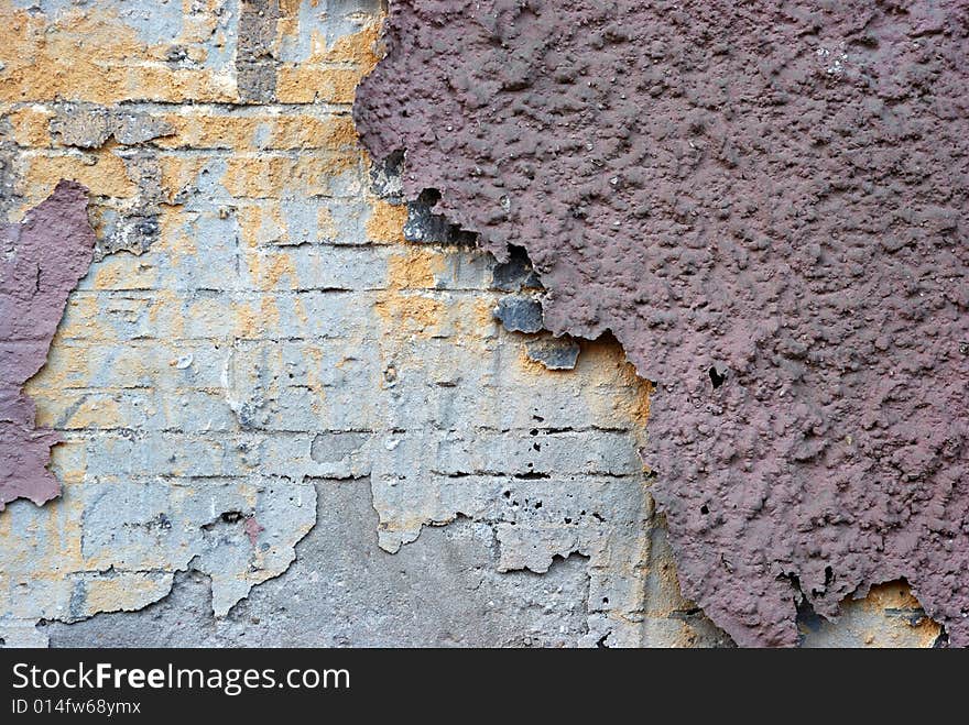 Old brick wall with prints of bricks