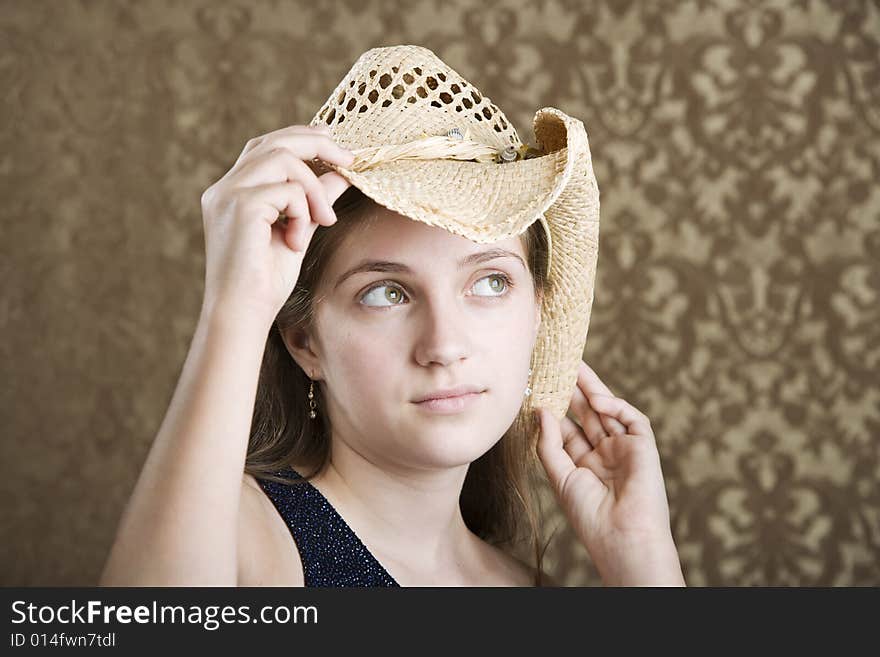 Confident Young Girl in a Cowboy Hat