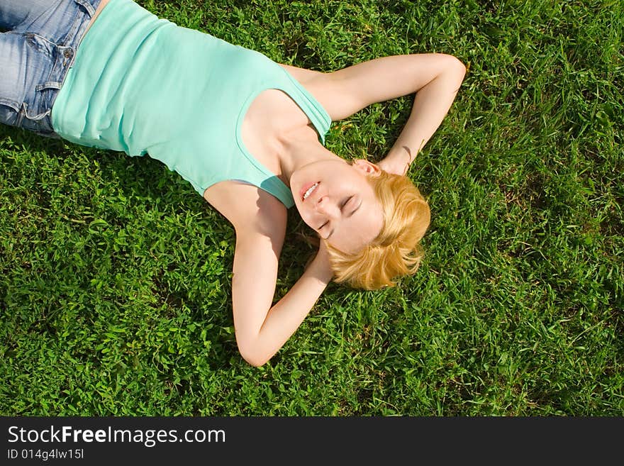 Sweet woman rest on the grass