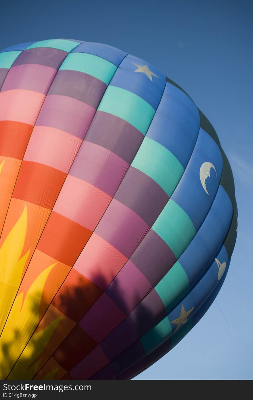 Colorful hot air balloon on a blue sky