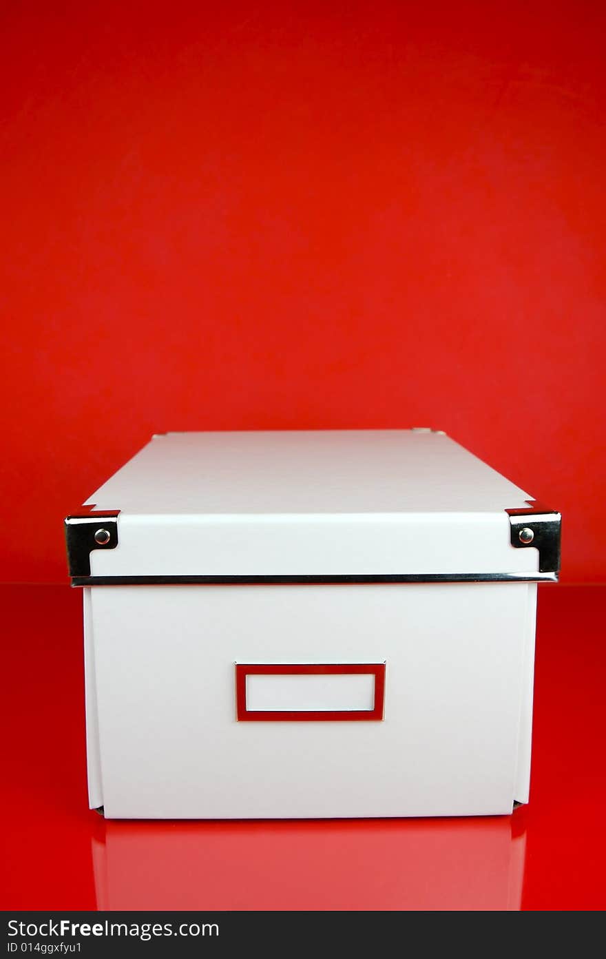 Storage boxes isolated against a red background