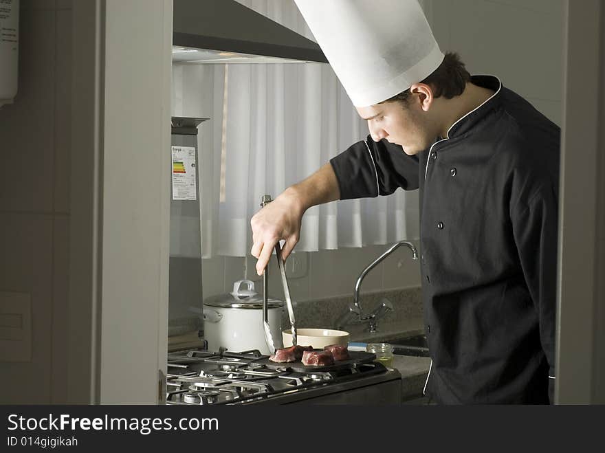 Chef Grilling Steaks