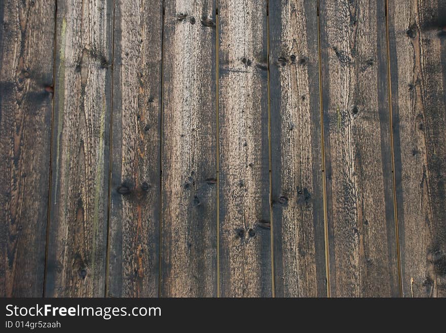 Wall built with old wooden planks