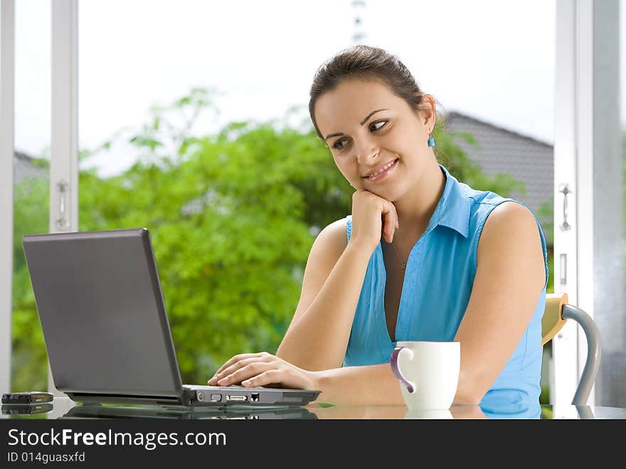 Portrait of young beautiful woman with her laptop. Portrait of young beautiful woman with her laptop