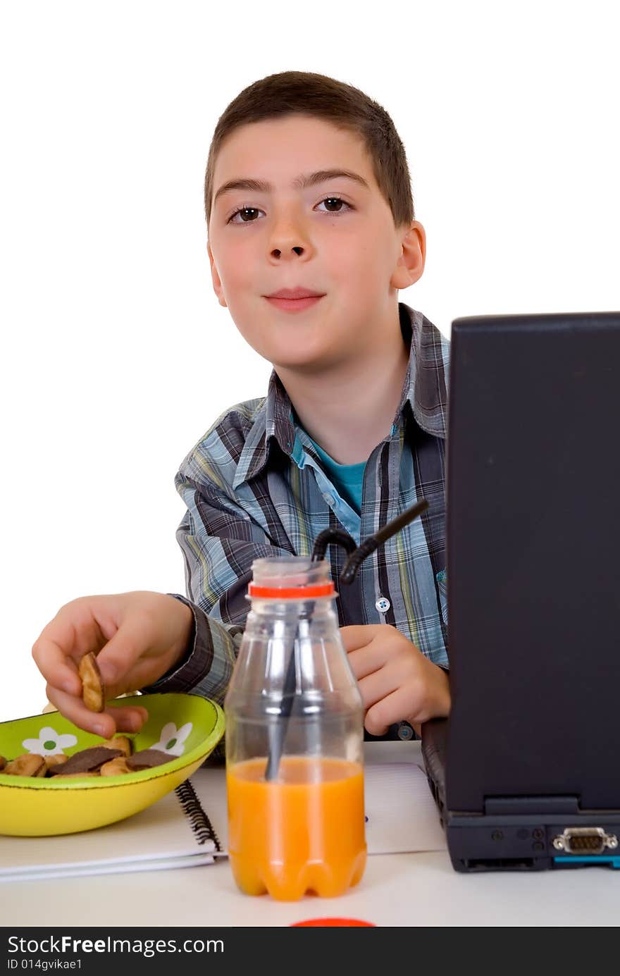 Happy smiling young boy doing studying and homework. Happy smiling young boy doing studying and homework