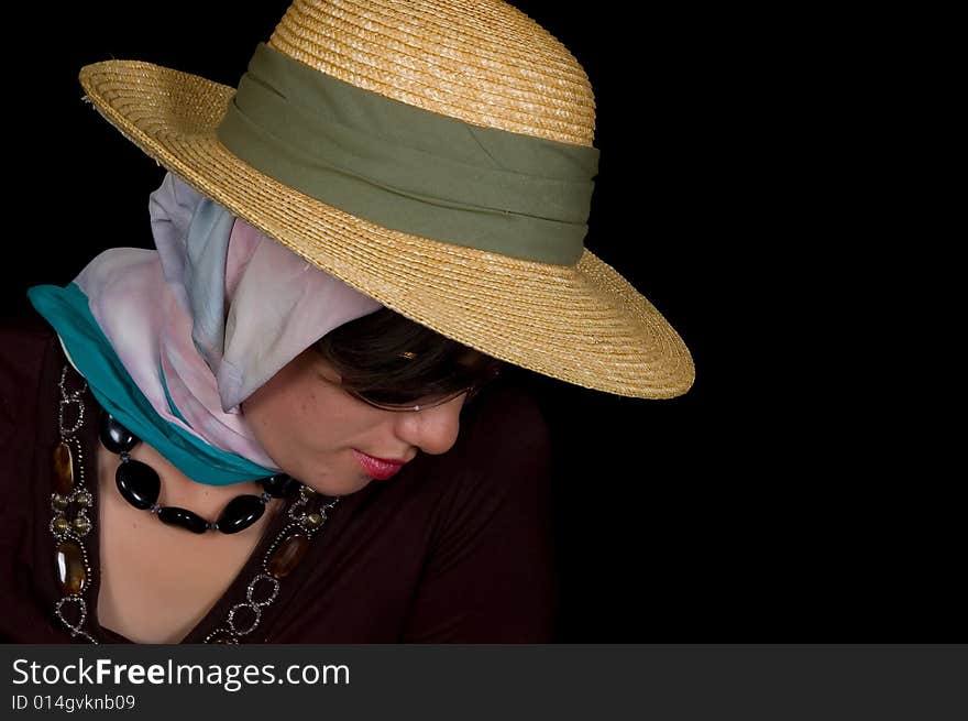 Glamorous young lady on black background, studio shot