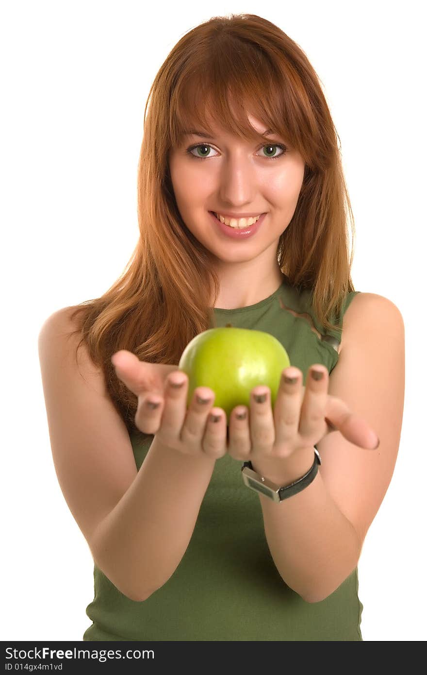 Young red-haired girl with green apple, focus on face. Young red-haired girl with green apple, focus on face