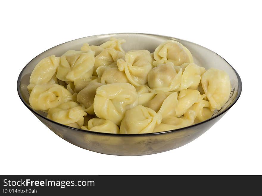 Cooked dumplings in glass-ware. isolated on white background.