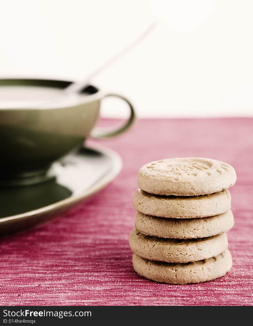 Cup of milk with biscuits. Cup of milk with biscuits