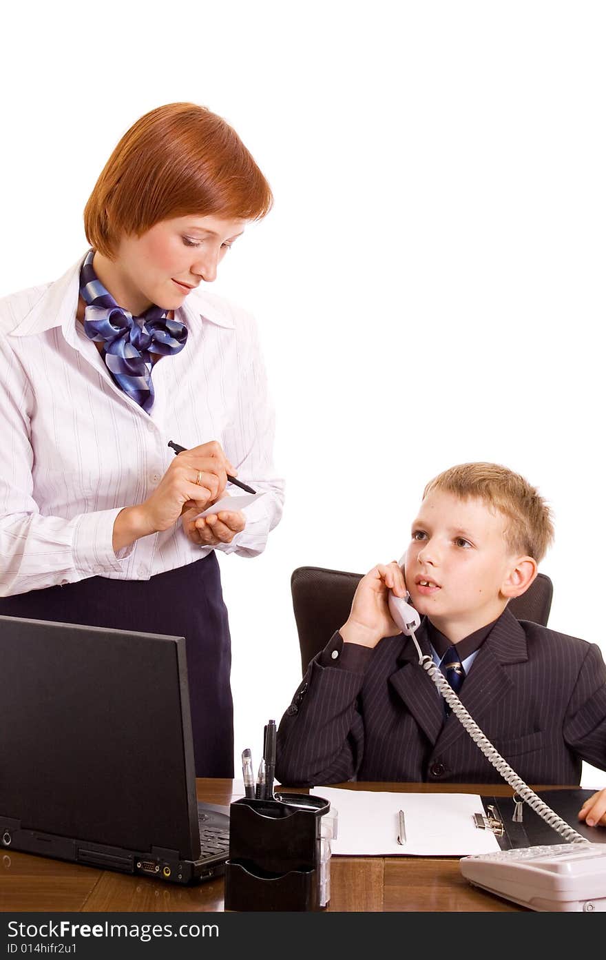 Very young businessman and his secretary. Group portrait in a high key. Very young businessman and his secretary. Group portrait in a high key.