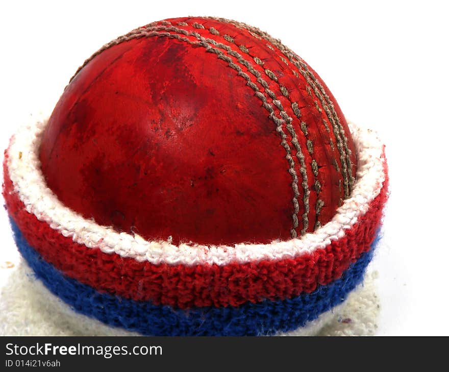 Cricket ball in sweat band