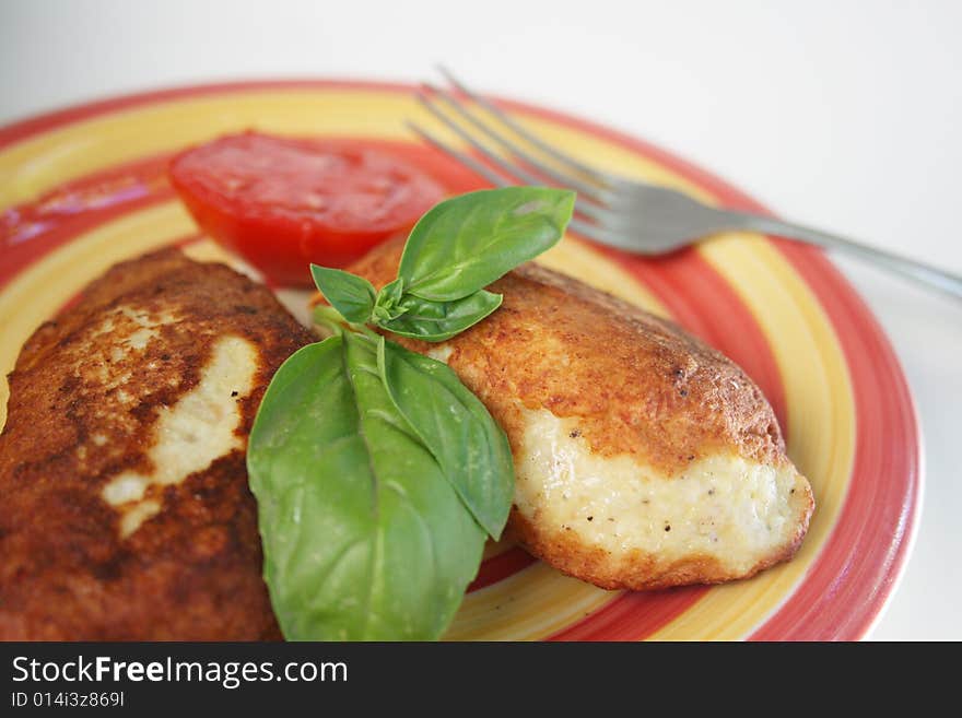 Juicy pork chops with a garnish from greens. A nourishing high-calorie dinner