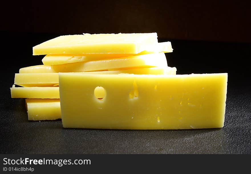 Photo vegetables yellow Bulbus on a dark background