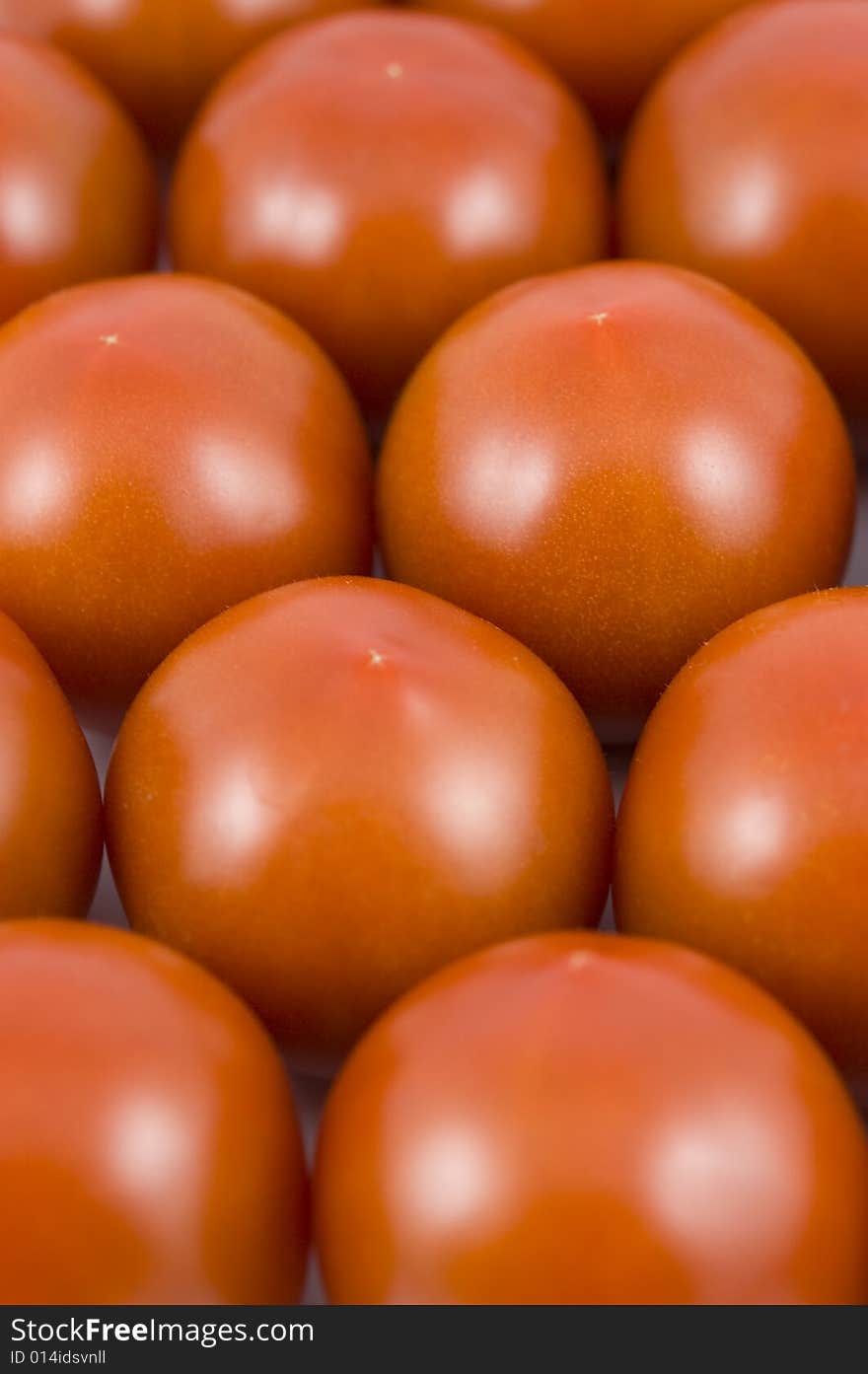 Well lineuped closeup fresh tomatos