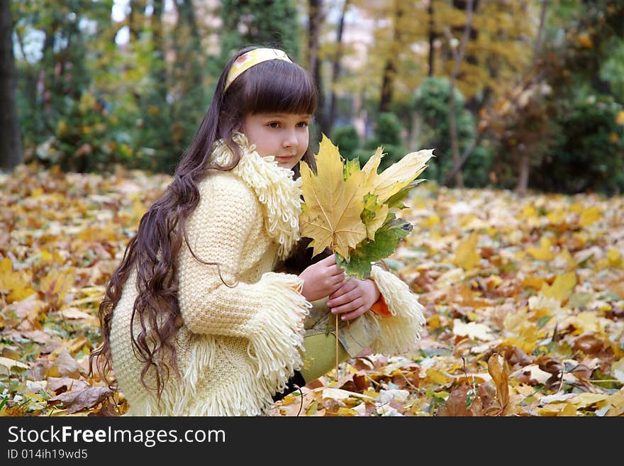 Girl in autumn park