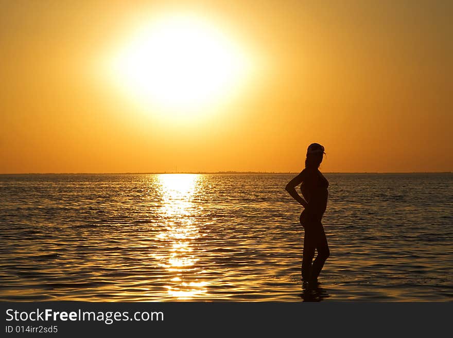 Silhouette of the young woman