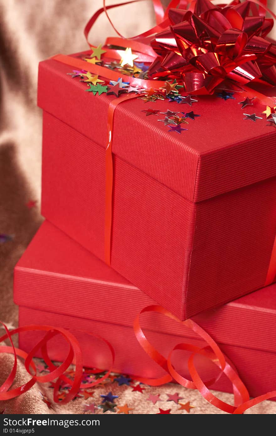 Red gift boxes with bows and stars