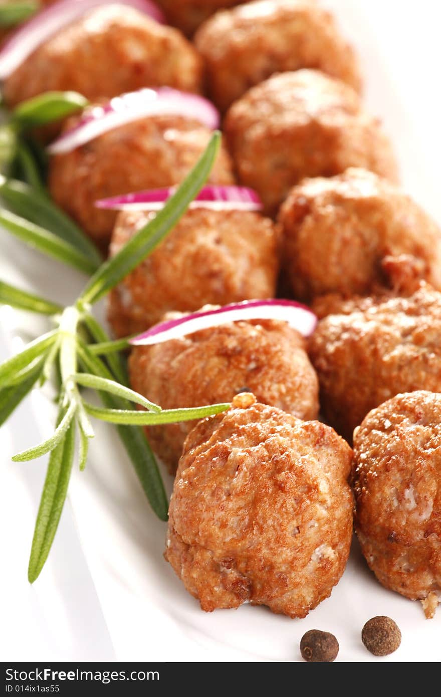 Fried pork with rosemary and onion. Fried pork with rosemary and onion